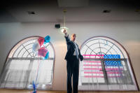 Photographer John Welsh captures a candid moment of Congressman Joe Walsh at his grand opening of his first district office in Fox Lake, IL the heart of his 8th district